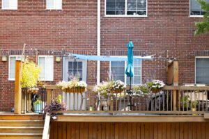 view of a large, wooden deck at Broad Ripple Apartments